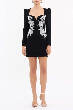 Monroe Long Sleeve Mini Dress Black by Rebecca Vallance – A striking crepe mini with silver sequin appliqué, V-wire neckline, and padded shoulders, perfect for cocktail parties, formal dinners, or glamorous date nights.