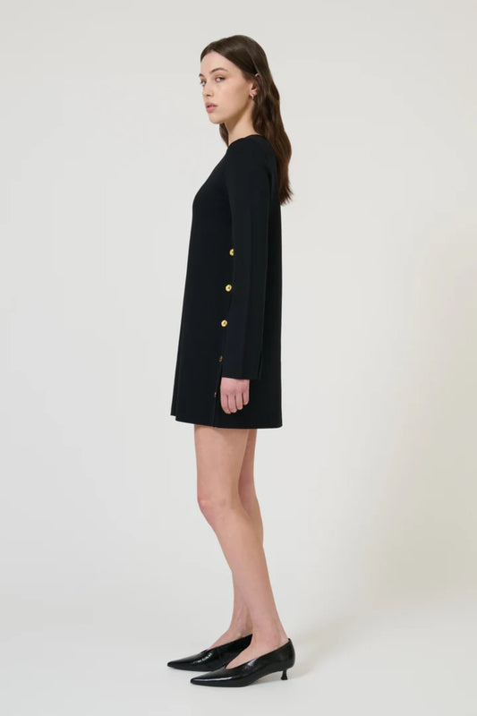 Naia Dress Black by Onte - mini dress with shift silhouette and gold button detail, designed for a sleek modern look.