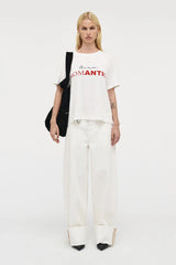 Nancy Barrel – White by Neuw Denim, mid-rise barrel leg jeans with cuffed hem and stretch comfort. Perfect for modern denim styling.