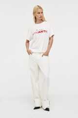 Nancy Barrel – White by Neuw Denim, mid-rise barrel leg jeans with cuffed hem and stretch comfort. Perfect for modern denim styling.