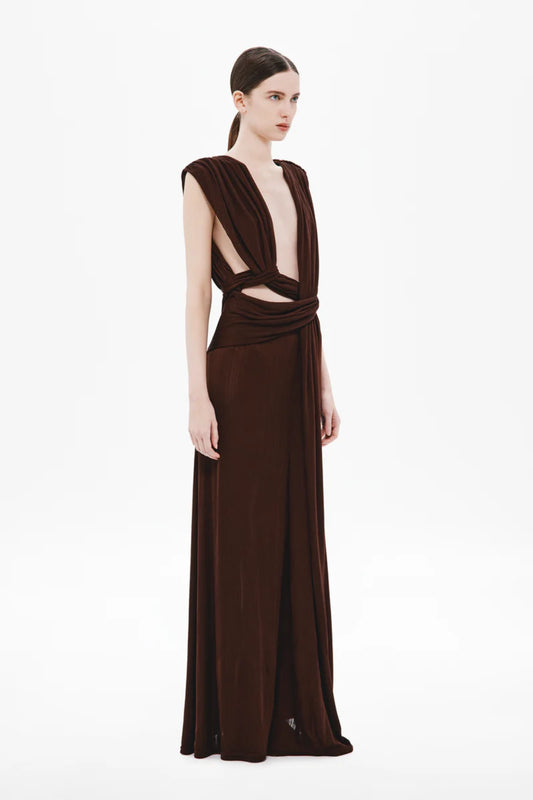 Naomi Draped Rib Dress by Misha, a ribbed plant-based acetate gown with plunging neckline, twisted waist, and side cutouts for modern elegance.
