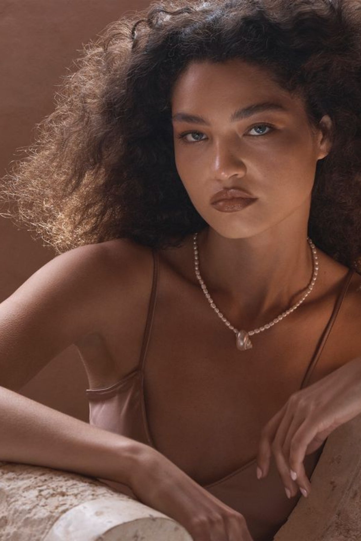 Narni Necklace by Amber Sceats, handcrafted in Italy with seashells and freshwater pearls plated in 24K gold for elegant coastal style.