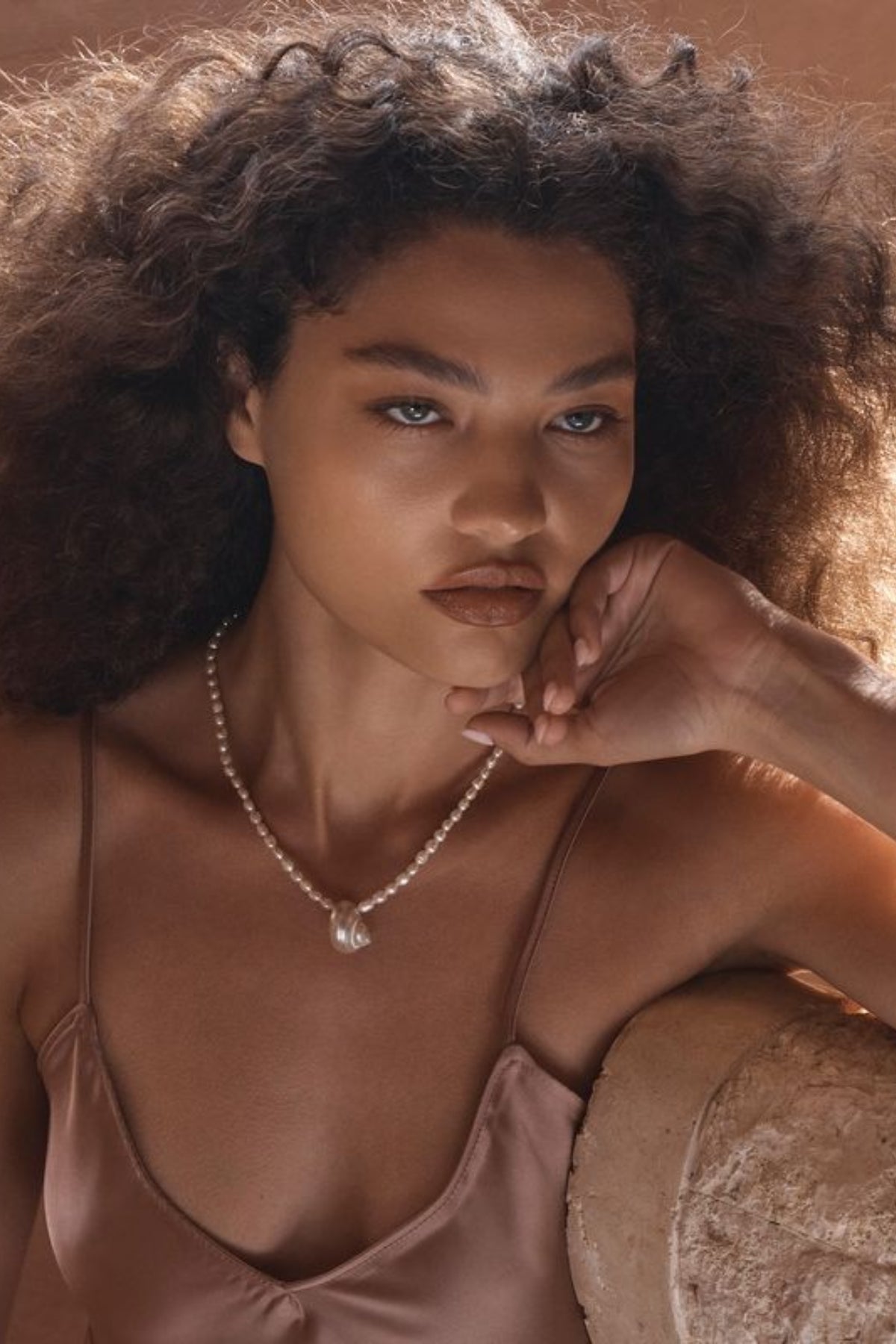 Narni Necklace by Amber Sceats, handcrafted in Italy with seashells and freshwater pearls plated in 24K gold for elegant coastal style.