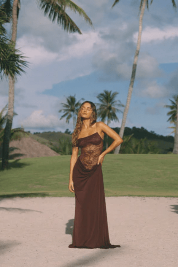 Sloane Dress Espresso by Natalie Rolt – A one-shoulder lace and jersey gown with waterfall split, exuding bold, sophistication.