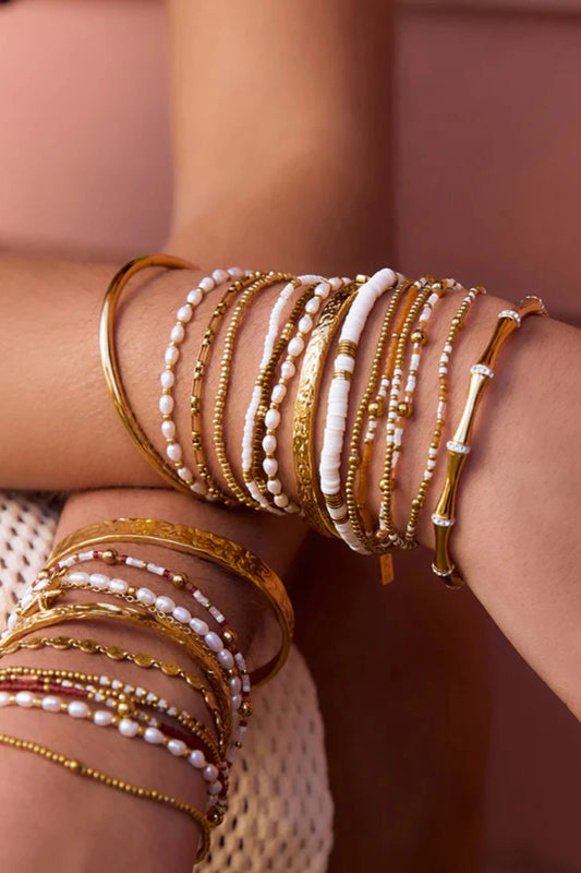 Nellie Bracelet Mango by Arms of Eve, vibrant beaded design with mango, white, and gold tones adding playful colour and chic sophistication