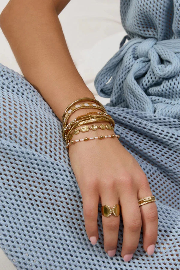 Nellie Bracelet Mango by Arms of Eve, vibrant beaded design with mango, white, and gold tones adding playful colour and chic sophistication