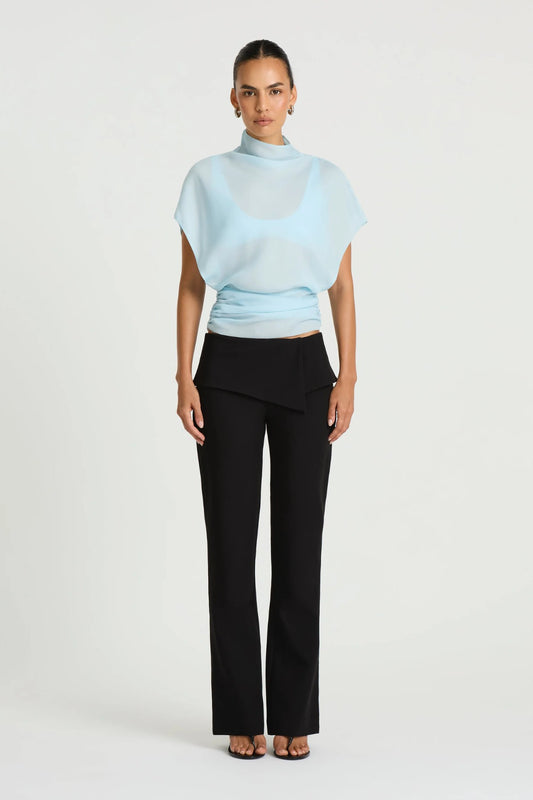 Nelly Pant in Black by Benni, a straight-leg tailored pant with an asymmetric folded waistband and structured fit.