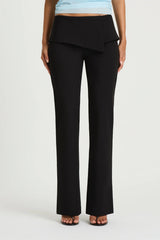 Nelly Pant in Black by Benni, a straight-leg tailored pant with an asymmetric folded waistband and structured fit.