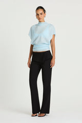 Nelly Pant in Black by Benni, a straight-leg tailored pant with an asymmetric folded waistband and structured fit.