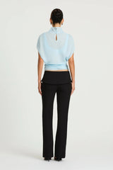 Nelly Pant in Black by Benni, a straight-leg tailored pant with an asymmetric folded waistband and structured fit.