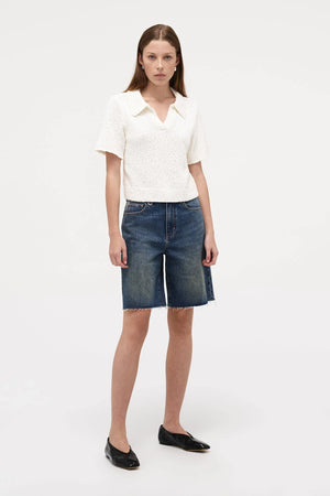 Neuw Denim Cecil Knit Polo in Espresso, cropped short sleeve knit tee with polo collar and ribbed hem finish.