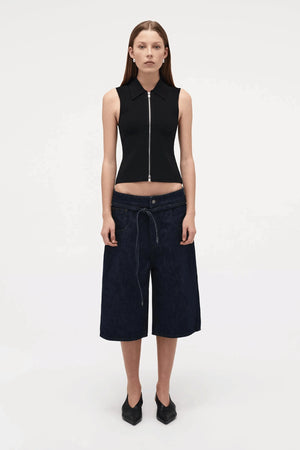 Neuw Denim Suki Zip Top in Black, a slim sleeveless knit with collared neckline and double zip closure. Perfect for modern minimalist styling.