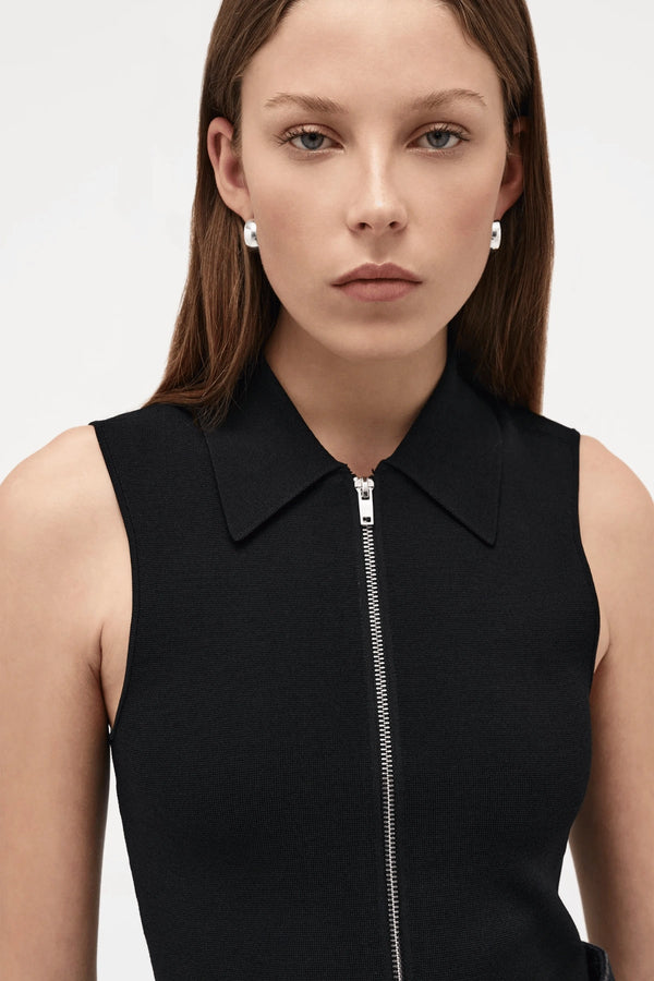 Neuw Denim Suki Zip Top in Black, a slim sleeveless knit with collared neckline and double zip closure. Perfect for modern minimalist styling.