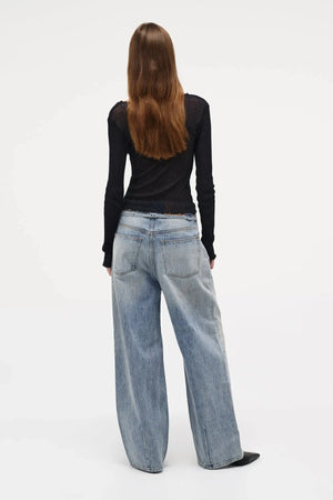 Neuw Denim Yoko Baggy Runway in light vintage indigo, wide-leg jeans with cinch waist feature and self-fabric belt.