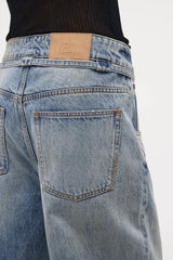 Neuw Denim Yoko Baggy Runway in light vintage indigo, wide-leg jeans with cinch waist feature and self-fabric belt.