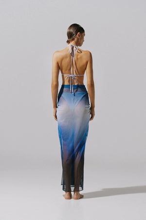 Nia Maxi Skirt by Baobab, a sheer mesh silhouette with cascading layers and a front slit. Perfect for breezy resort styling.