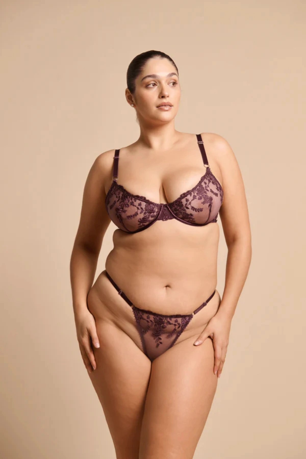 Introducing the Kat the Label Nicolette Underwire Bra in Raisin, scalloped sheer tulle lace cups with underwire support, stretch mesh back, and double straps for comfort and elegance.