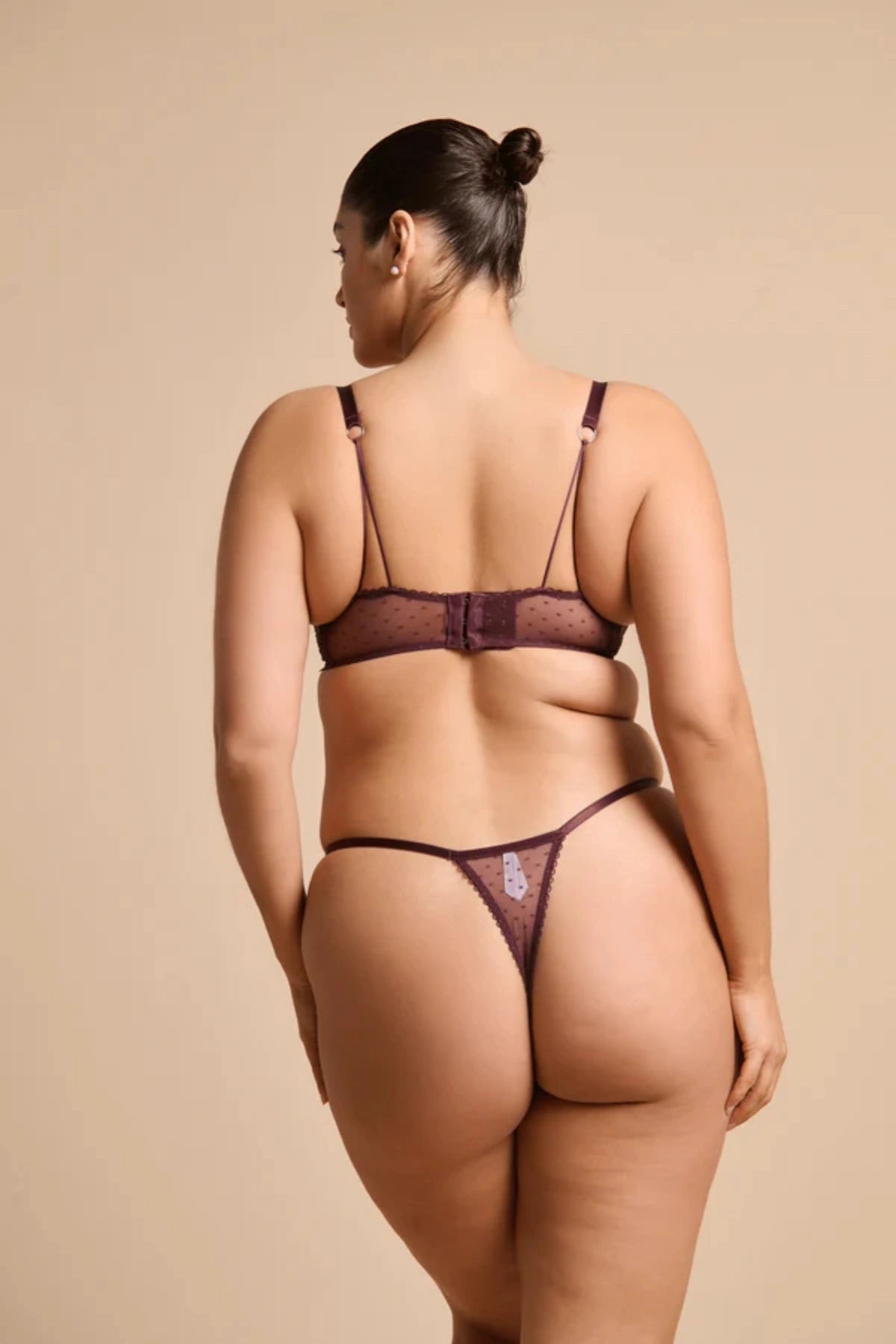 Introducing the Kat the Label Nicolette Underwire Bra in Raisin, scalloped sheer tulle lace cups with underwire support, stretch mesh back, and double straps for comfort and elegance.