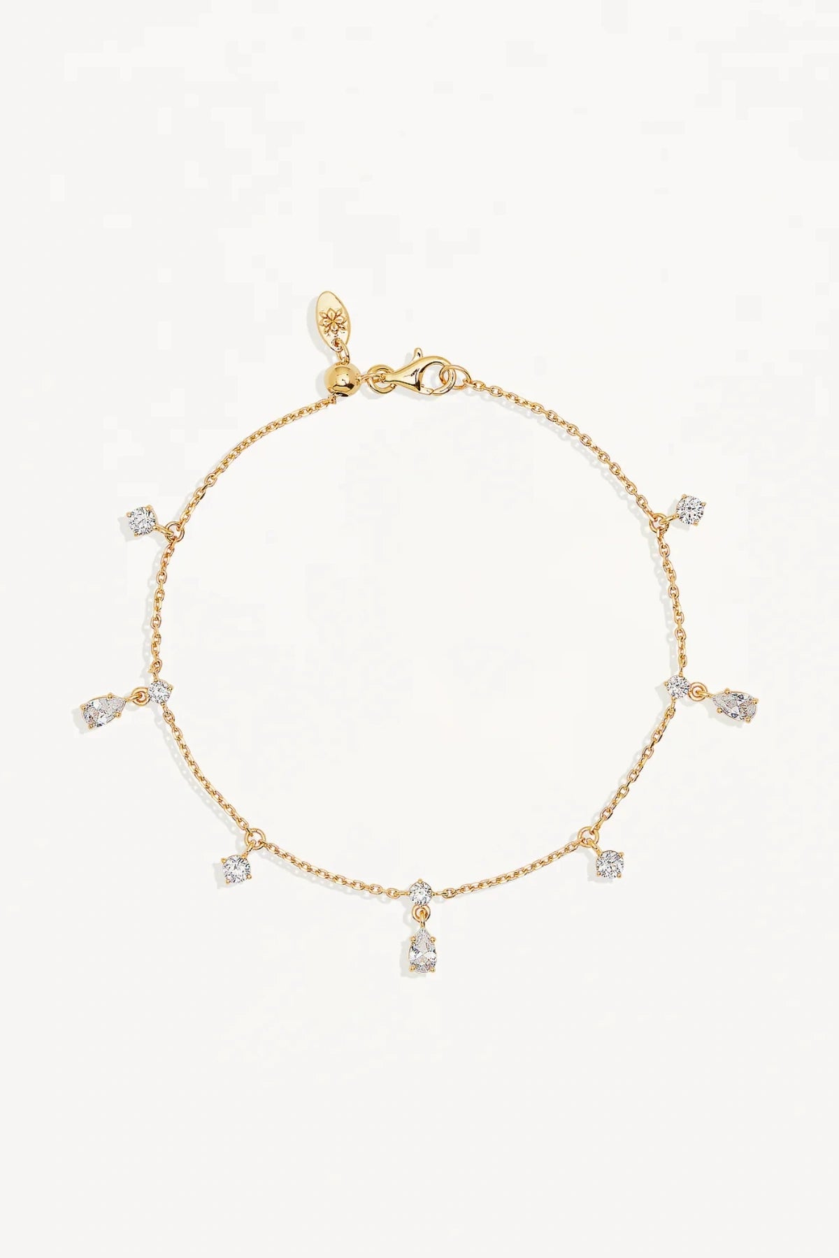 No Rain, No Flowers Bracelet by By Charlotte, 18k gold vermeil fine chain bracelet with dewdrop cubic zirconias.
