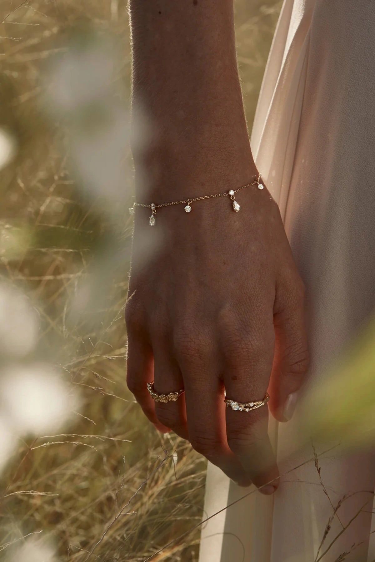 No Rain, No Flowers Bracelet by By Charlotte, 18k gold vermeil fine chain bracelet with dewdrop cubic zirconias.
