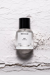 Muse 50ml by Who Is Elijah, a captivating unisex fragrance with tropical solar top notes, warm jasmine heart, and a musky, amberwood base.