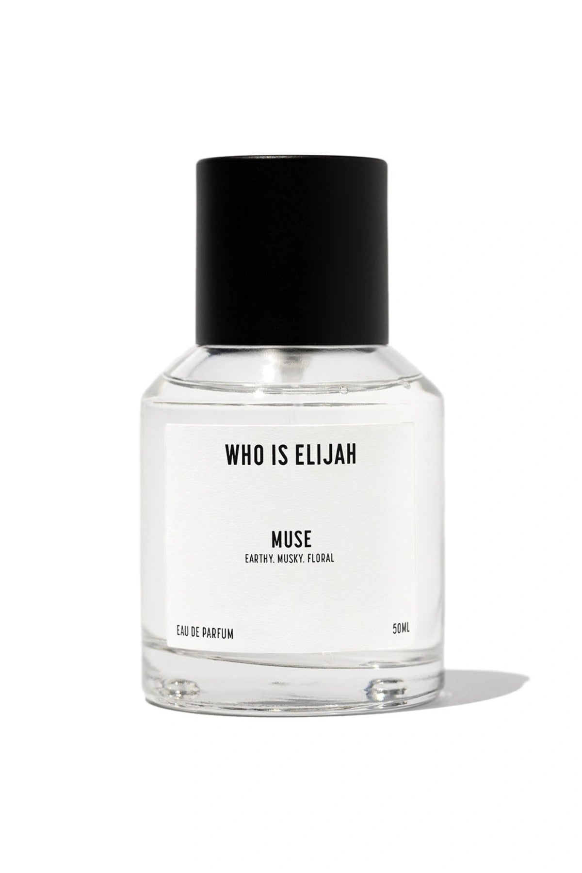 Muse 50ml by Who Is Elijah, a captivating unisex fragrance with tropical solar top notes, warm jasmine heart, and a musky, amberwood base.