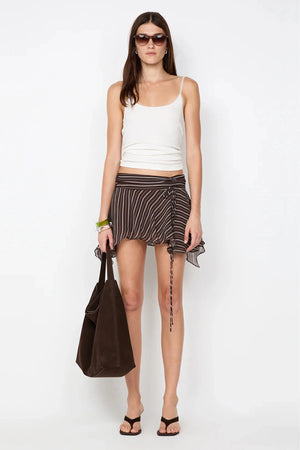 Norma Mini Skirt Dark Slice Stripe by Bec and Bridge, a low-waist flounce mini with drawstring detail and fluid drape.