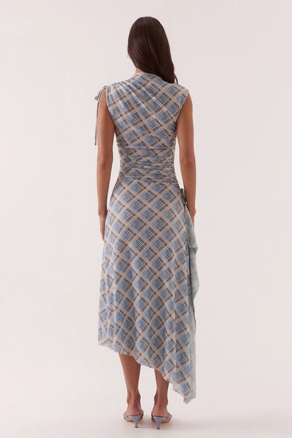 Novalyn Plaid Dress Check by Sovere, plaid midi dress with draped neckline and side tie detail. Perfect for elevated day to night styling.
