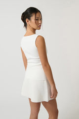 Margarita Top White by Onte, slim-fitting Milano knit tank with wide straps and square neckline, featuring tonal buttons, perfect for trendy viral chic and versatile layering.