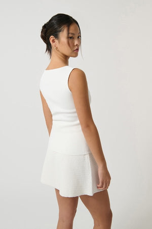 Margarita Top White by Onte, slim-fitting Milano knit tank with wide straps and square neckline, featuring tonal buttons, perfect for trendy viral chic and versatile layering.