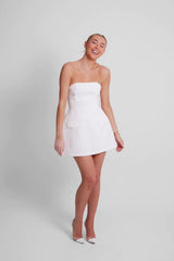 The Ultimate Muse Strapless Dress White by Odd Muse – Summer-ready strapless dress with corset top and voluminous skirt.