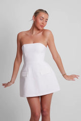 The Ultimate Muse Strapless Dress White by Odd Muse – Summer-ready strapless dress with corset top and voluminous skirt.