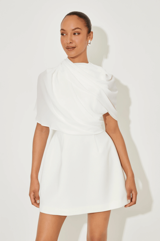 Ultimate Muse Gathered Mini Dress White by Odd Muse, a mesh-draped silhouette with open back and wrap detail. Perfect for modern bridal moments.