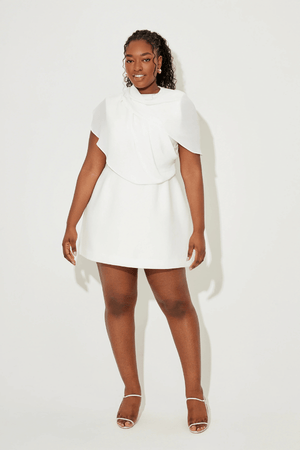 Ultimate Muse Gathered Mini Dress White by Odd Muse, a mesh-draped silhouette with open back and wrap detail. Perfect for modern bridal moments.