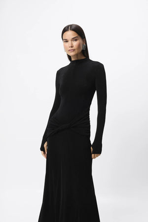Ode Maxi Dress Black by Mossman – lustrous stretch jersey maxi dress with asymmetric twist waist and long sleeves.