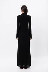 Ode Maxi Dress Black by Mossman – lustrous stretch jersey maxi dress with asymmetric twist waist and long sleeves.