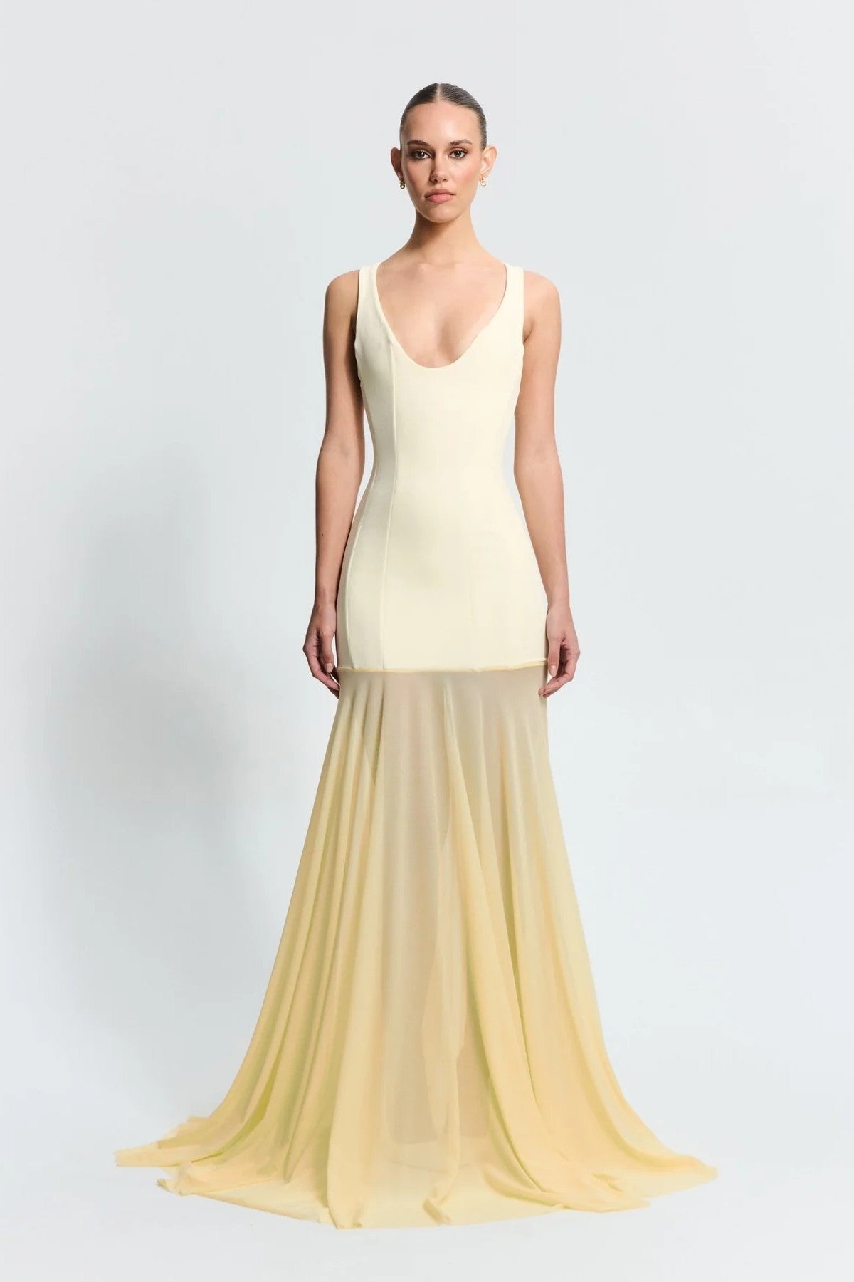 Odessa Gown in Lemon by Effie Kats, a sleek boned crepe bodice with sheer mesh skirt. Perfect for galas or formal evening celebrations.