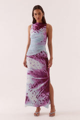 Odette Dress Blue Orchid by Sovere, printed maxi dress with draped detail and fitted silhouette. Perfect for events or standout styling.