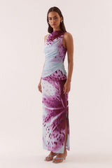 Odette Dress Blue Orchid by Sovere, printed maxi dress with draped detail and fitted silhouette. Perfect for events or standout styling.