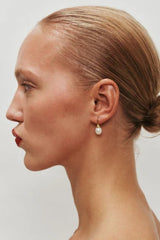 Odette Pearl Earrings by Heaven Mayhem – gold hook earrings with luminous pearl drops, perfect for timeless everyday elegance.