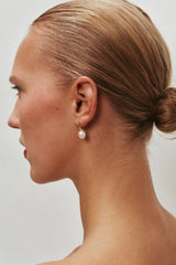 Odette Pearl Earrings by Heaven Mayhem – gold hook earrings with luminous pearl drops, perfect for timeless everyday elegance.