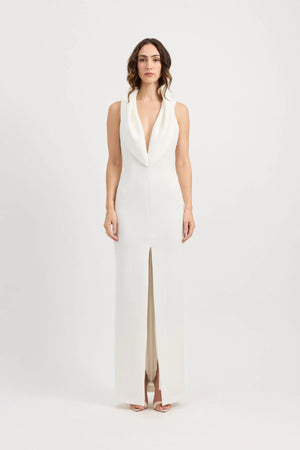Odora Dress in Ivory by Tojhà, a sculpted halter maxi in lightweight scuba with plunging neckline, front split, and low back for modern allure.