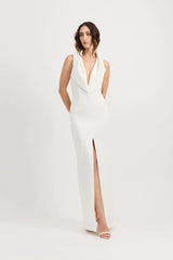 Odora Dress in Ivory by Tojhà, a sculpted halter maxi in lightweight scuba with plunging neckline, front split, and low back for modern allure.