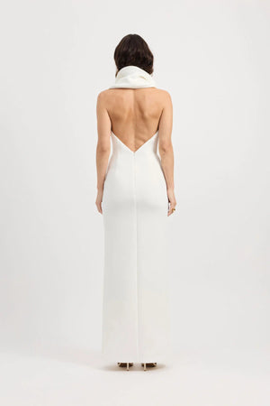 Odora Dress in Ivory by Tojhà, a sculpted halter maxi in lightweight scuba with plunging neckline, front split, and low back for modern allure.