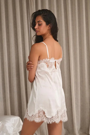 Olivia Slip Ivory by Kat the Label – a satin slip with lace trim and soft drape. Perfect for bridal or elevated everyday wear.