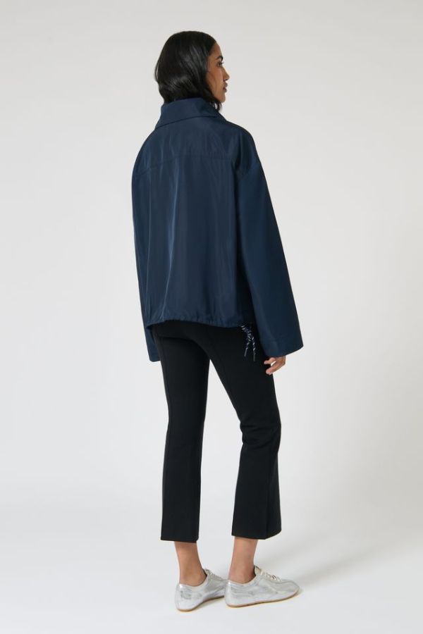 Onte Adela Windbreaker in Navy, oversized water-resistant jacket with funnel neck, paracord drawstrings, and two-ended silver zips.