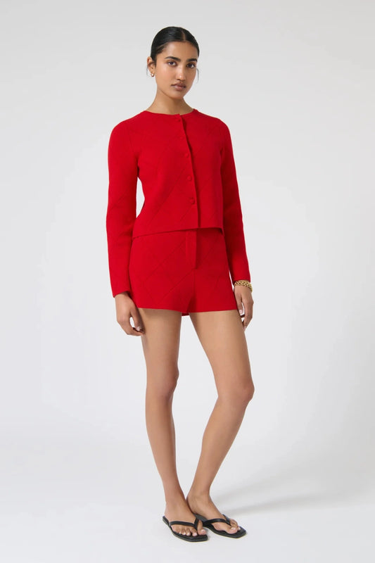 Onte Aldara Cardigan in red cotton with diamond pointelle knit, boxy fit, long sleeves, and self-covered buttons.