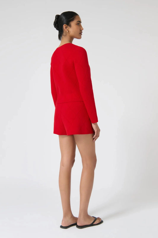 Onte Aldara Cardigan in red cotton with diamond pointelle knit, boxy fit, long sleeves, and self-covered buttons.