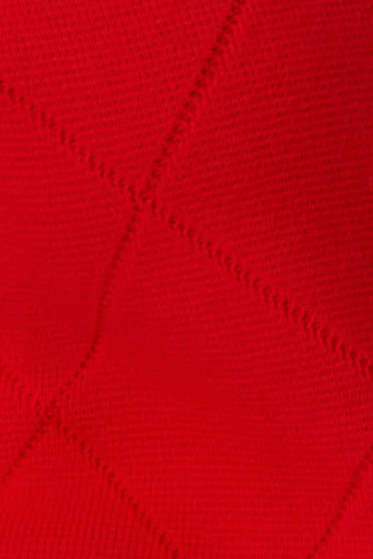 Onte Aldara Shorts in red cotton with diamond pointelle knit, mini length, and slight A-line fit.
