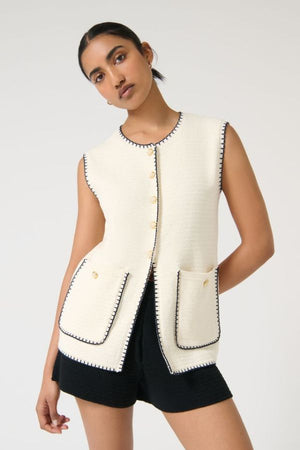 Onte Helena Gilet in Trim, crochet-style sleeveless knit with enamel gold buttons and patch pockets, a relaxed layer for polished styling.